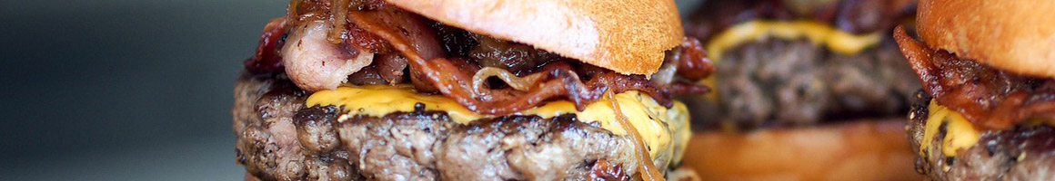 Eating Burger Hot Dog at Herfy's Burger restaurant in Orting, WA.